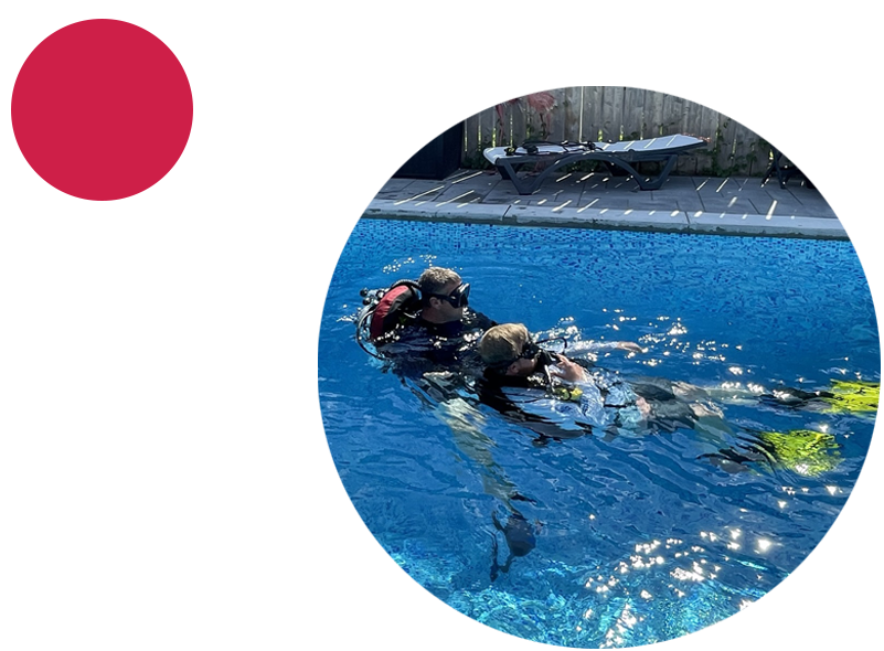 Child learning how to scuba dive at Double Down Divers.