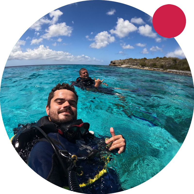 Pro divers open water diving training in tropics.